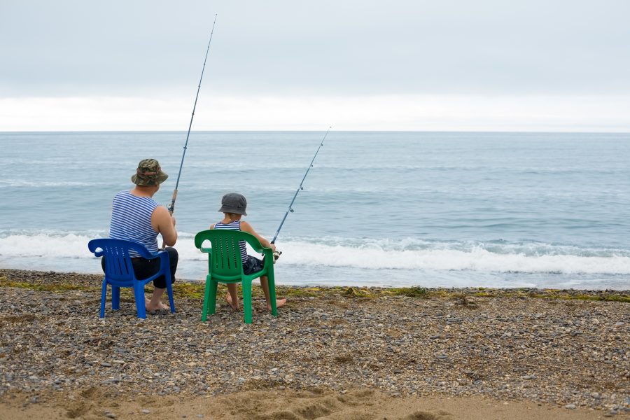 A 60-year-old man and his grandson go fishing together.